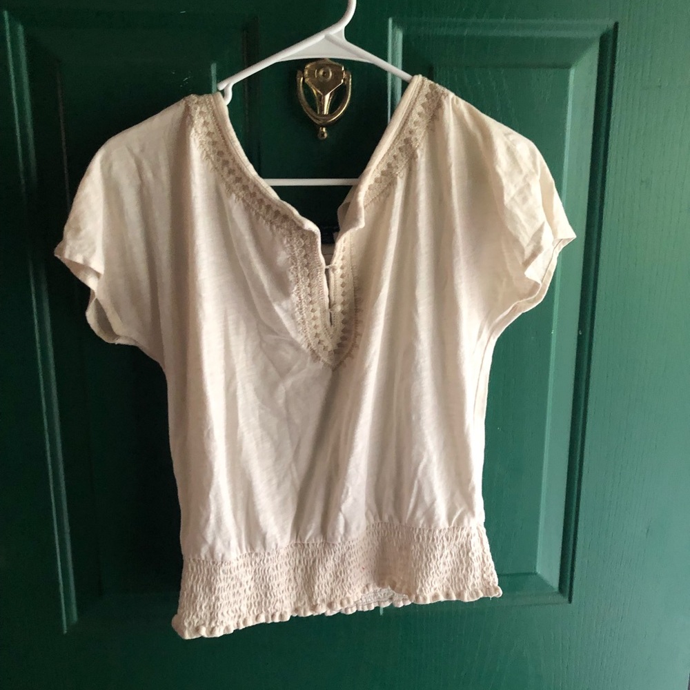 Cream blouse with button detail